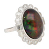 10.08 Carat Black Opal with Baguette and Round Diamond Halo Cocktail Ring