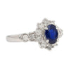 1.16 Carat Oval Blue Sapphire and Diamond Textured Halo Platinum Ring