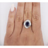 2.58 Carat Oval Cut Blue Sapphire and Diamond Halo Platinum Ballerina Ring