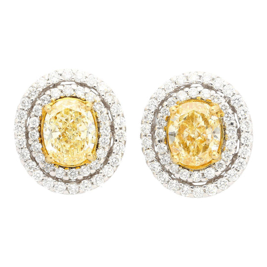 3.73 Carat TW Oval Cut Fancy Yellow Diamond Double Halo Stud Earrings