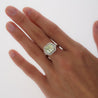 4.26 Carat Radiant Cut Fancy Yellowish Green SI1 Clarity Diamond Ring