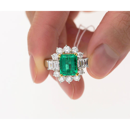 4.42 Carat TW Colombian Emerald with Round & Emerald Cut Diamond Halo Ring