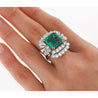 6.26 Carat Emerald Cut Emerald with Trillion and Round Cut Diamond Side Stone Ring in 18K White, Yellow Gold