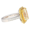 Emerald Cut Natural 7.25 Carat Fancy Light Yellow Diamond with Round Diamond Halo Ring