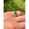 GIA certified Oval Jade with Diamond Sidestones in Platinum Ring