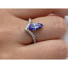 Marquise Cut Tanzanite Curved Ring in 18k White Gold