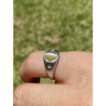 Diamants œil-de-chat naturels et diamants taille baguette sur une Bague en platine – Assay Jewelers