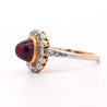 Vintage Cabochon Pinkish Purple Sapphire & Old Euro Diamond Floral Halo Ring