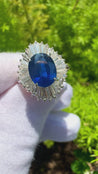 2.58 Carat Oval Cut Blue Sapphire and Diamond Halo Platinum Ballerina Ring