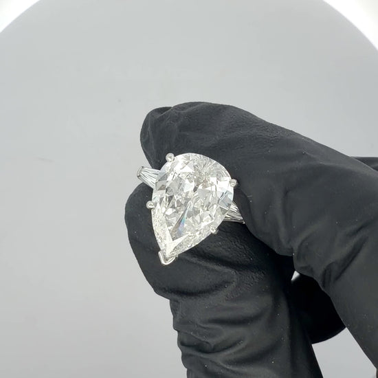 GIA Certified 7.03 Carat Pear Cut F/SI2 Diamond Platinum 3 Stone Ring