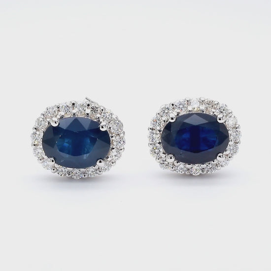 3.70 Carat Oval Dark Blue Sapphire & 0.48 Carat Diamond Halo 18K White Gold Stud